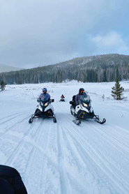 Snowmobilers riding near Hot Sulphur Springs, Colorado